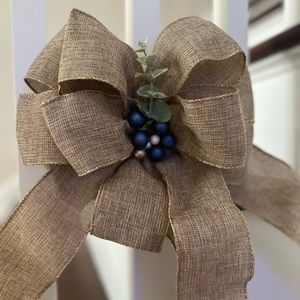 Burlap with blue and eucalyptus leave bows for decoration